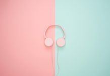 pink headphones on pink and teal background
