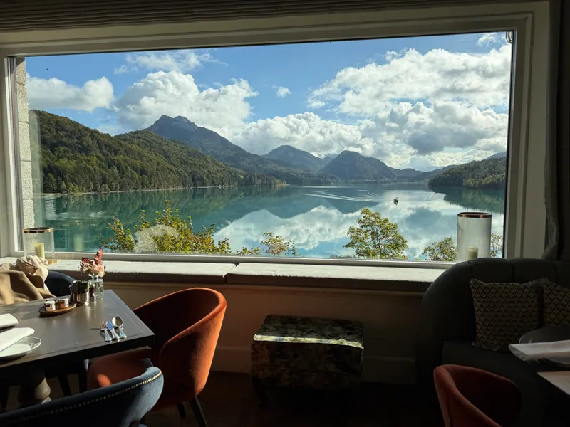 A panoramic lake and mountain view from Rosewood Schloss Fuschl